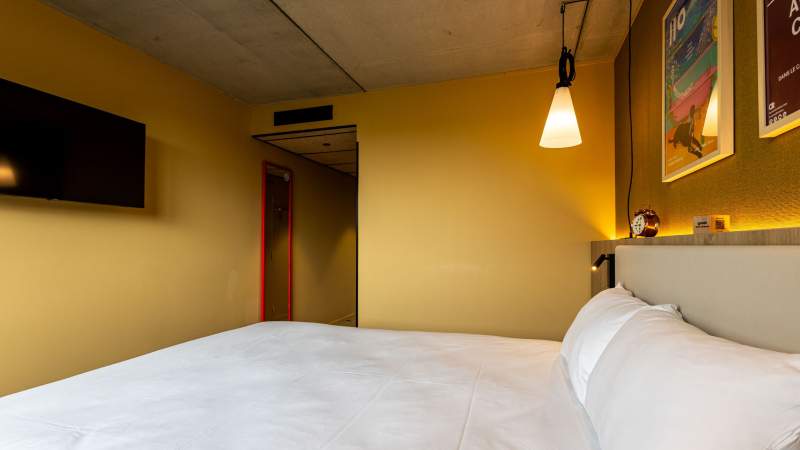 Lits dans une chambre double · Galerie photos · Greet Hôtel Reims Tinqueux · Hôtel Tinqueux